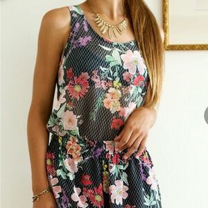 Candice Held | silk tank top in “Fishnet Floral” print.